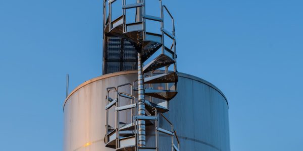 backyard-winery-sunset-with-metal-wine-storage-tanks (1)